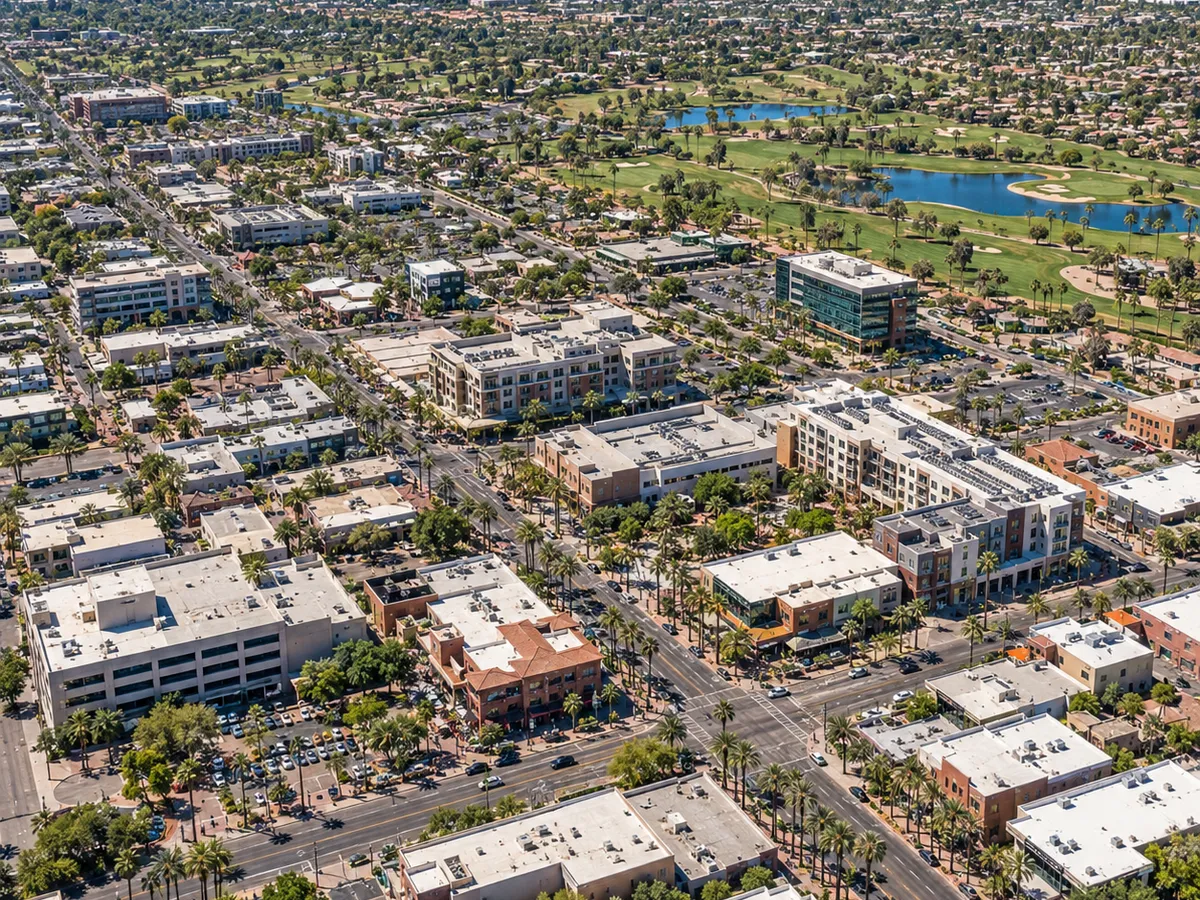 Aerial drone view of a golf course and lake community near downtown Chandler, Arizona.